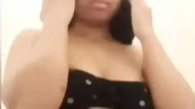 Chubby shy Indian girl showing round boobs to lover