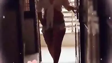 desi wife showing of her boobs in balcony